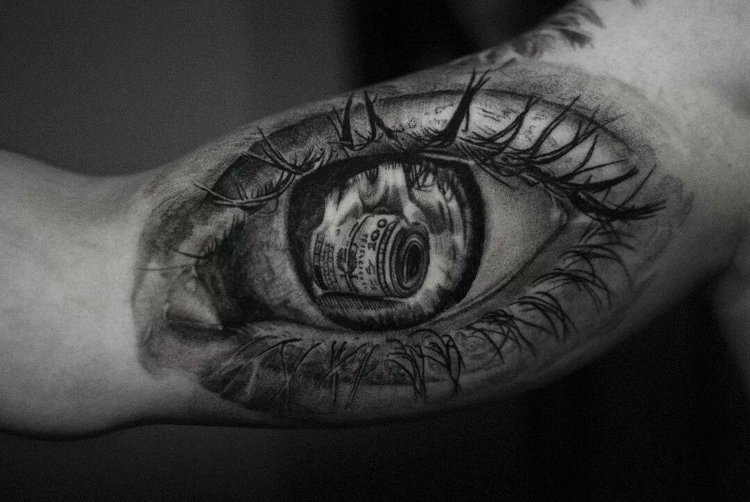 Inksearch tattoo Marcin Nencek Grey eye Tattoo
