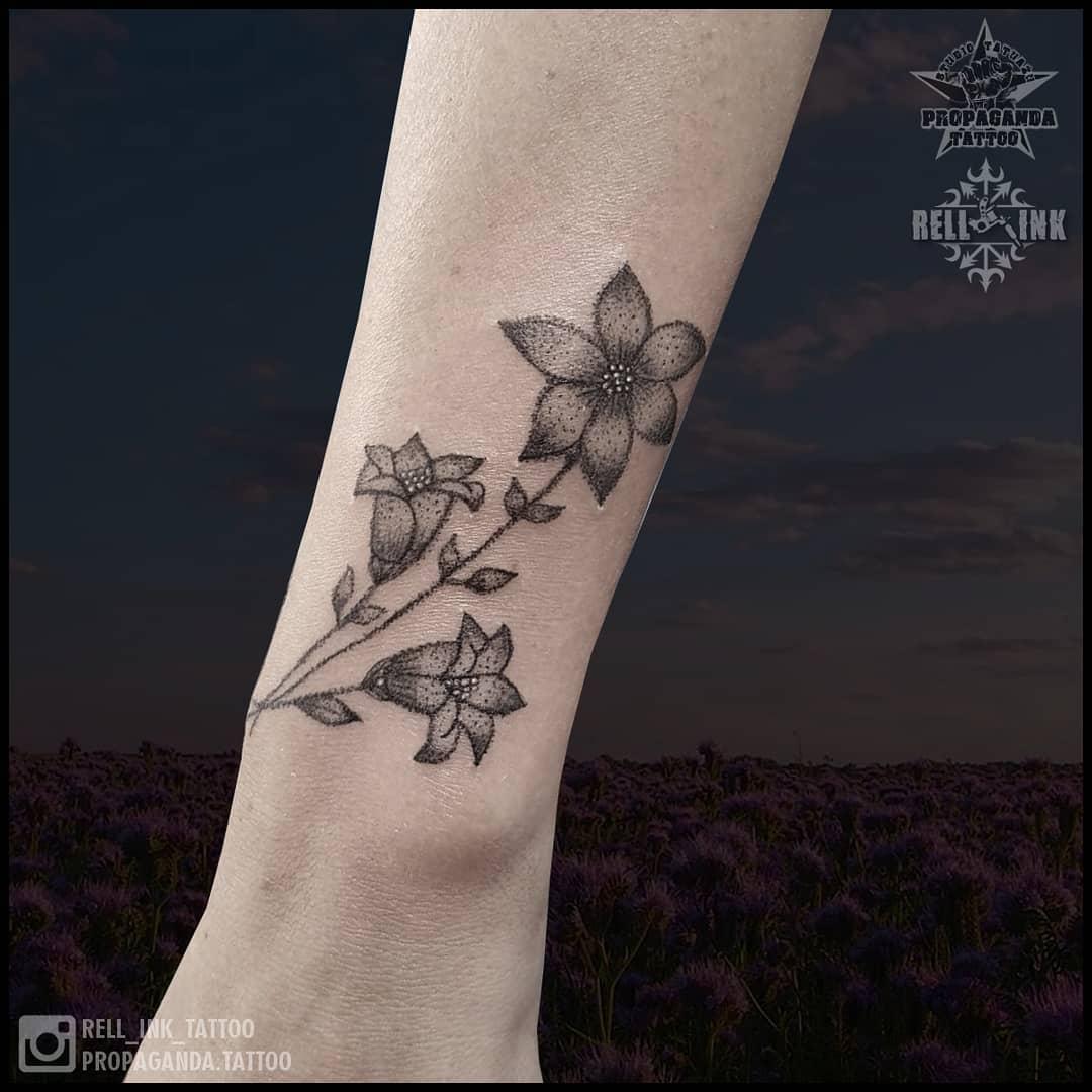 Inksearch tattoo Rell - Propaganda Tattoo
