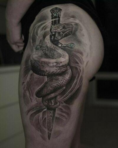 Marcin Nencek Grey eye Tattoo inksearch tattoo